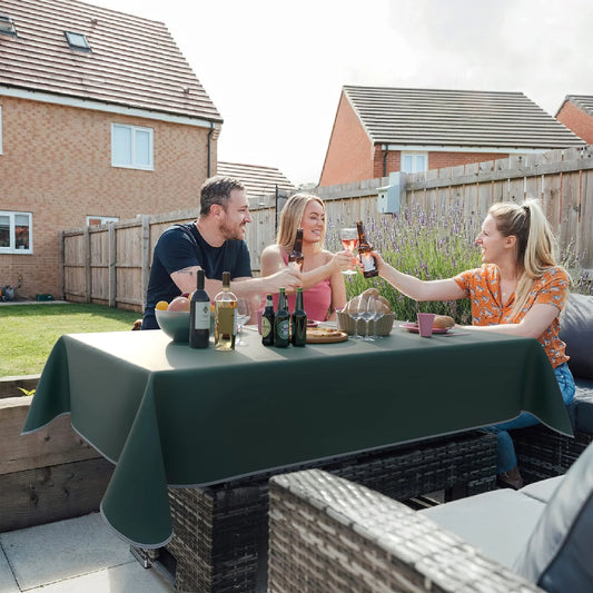 outdoor picnic with green  vinyl tablecloth